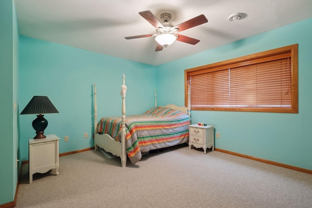 bedroom with ceiling fan and carpet flooring