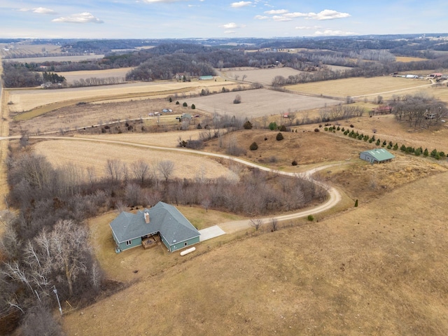 birds eye view of property featuring a rural view