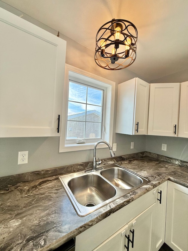 kitchen with sink and white cabinets