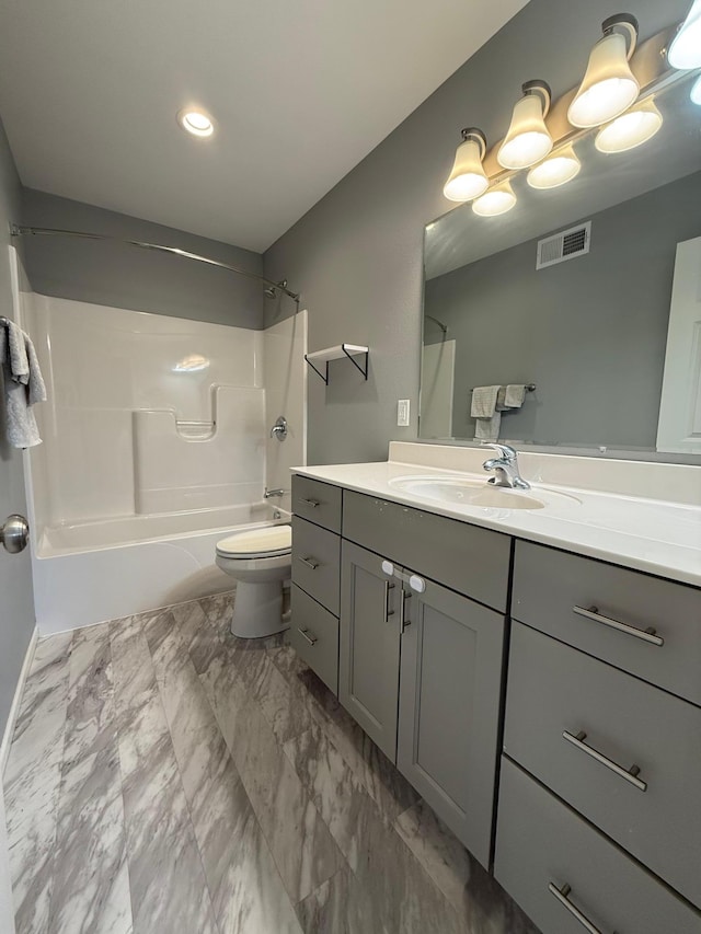 full bathroom featuring vanity, toilet, and shower / bath combination