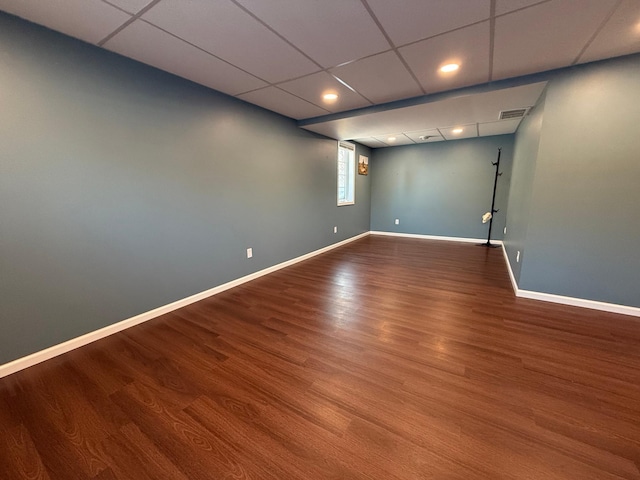 unfurnished room with hardwood / wood-style flooring