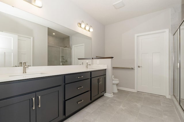 bathroom featuring vanity, toilet, and walk in shower