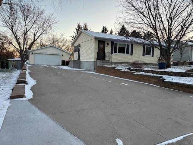 view of front of property with an outbuilding and a garage