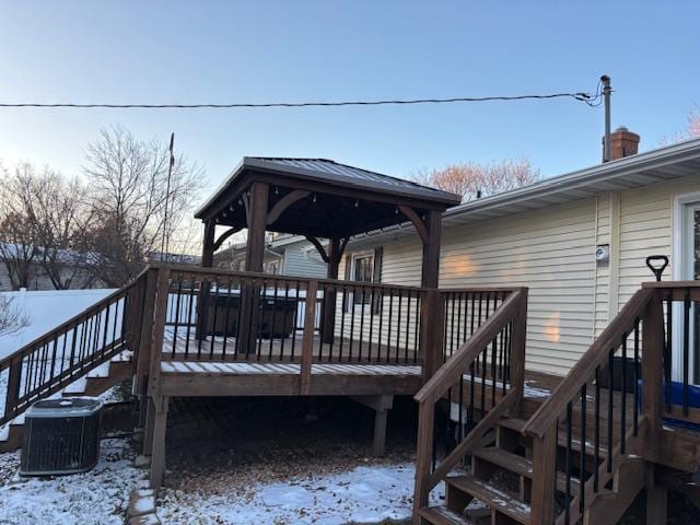 snow covered deck with cooling unit