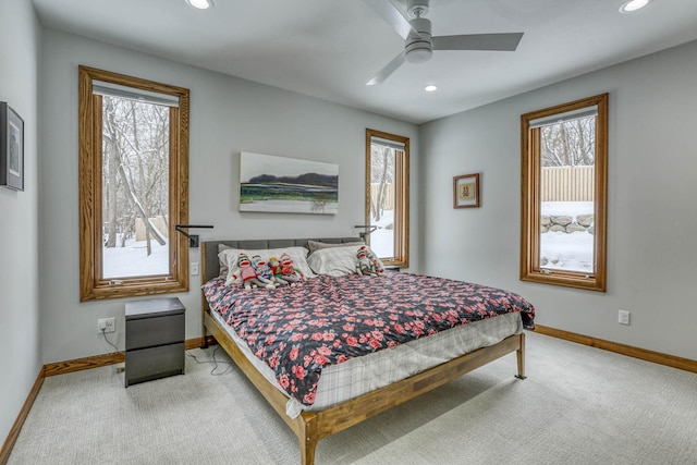 5517 Dickson Rd, Minnetonka, MN 55345 - carpeted bedroom with multiple windows, baseboards, recessed lighting, and ceiling fan