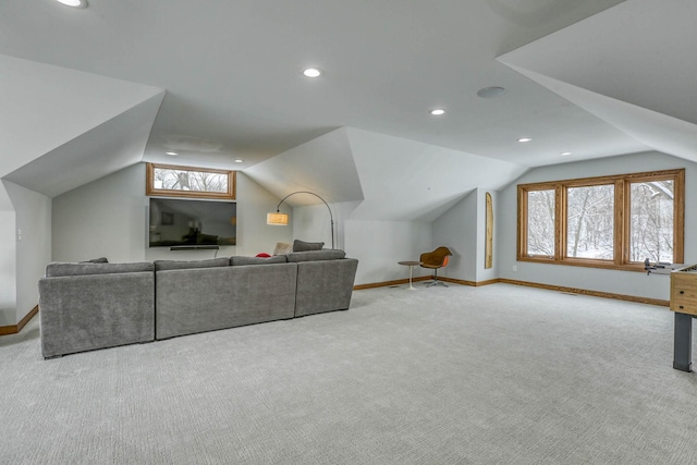 5517 Dickson Rd, Minnetonka, MN 55345 - living area with vaulted ceiling, carpet flooring, baseboards, and recessed lighting