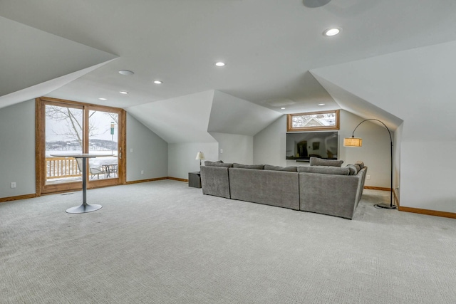 5517 Dickson Rd, Minnetonka, MN 55345 - home theater with light carpet, baseboards, lofted ceiling, plenty of natural light, and recessed lighting