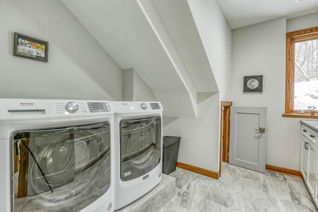 5517 Dickson Rd, Minnetonka, MN 55345 - washroom with washing machine and clothes dryer and baseboards