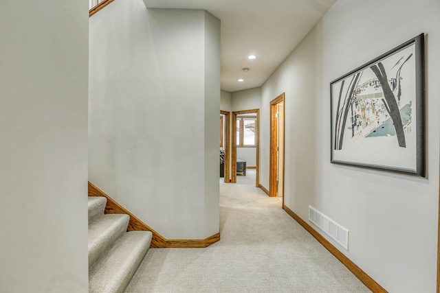 5517 Dickson Rd, Minnetonka, MN 55345 - hall featuring baseboards, carpet, recessed lighting, and stairs