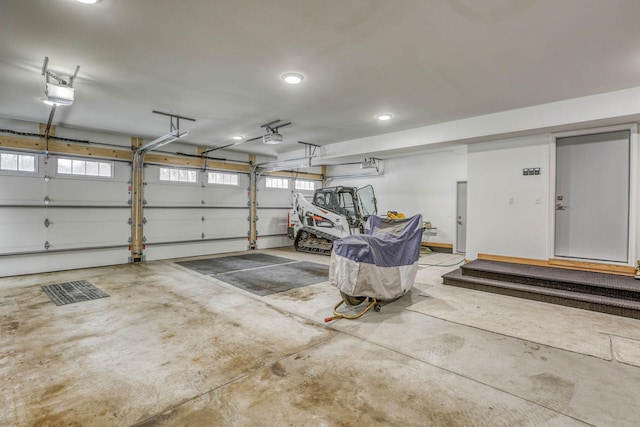 5517 Dickson Rd, Minnetonka, MN 55345 - garage with a garage door opener and recessed lighting