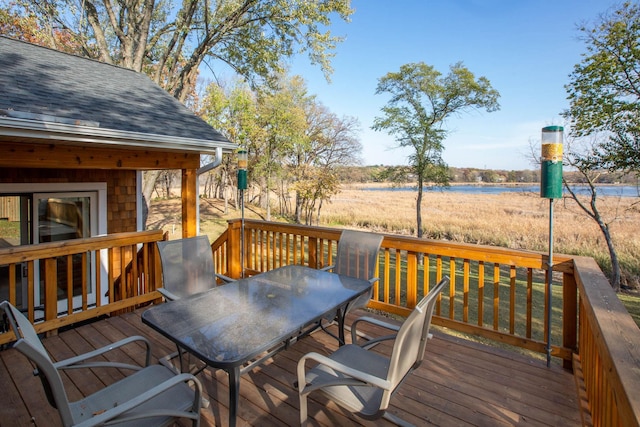 5517 Dickson Rd, Minnetonka, MN 55345 - wooden terrace with outdoor dining area and a water view