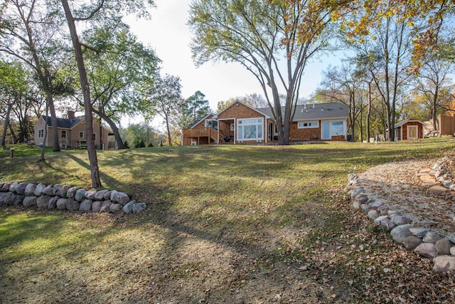 5517 Dickson Rd, Minnetonka, MN 55345 - view of grassy yard with a wooden deck