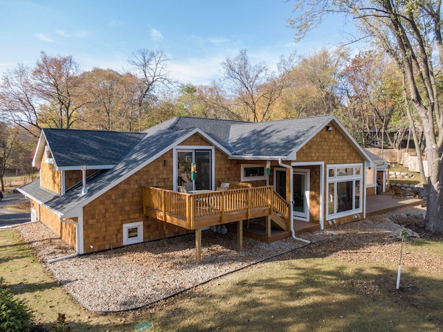 5517 Dickson Rd, Minnetonka, MN 55345 - rear view of property with a shingled roof and a deck