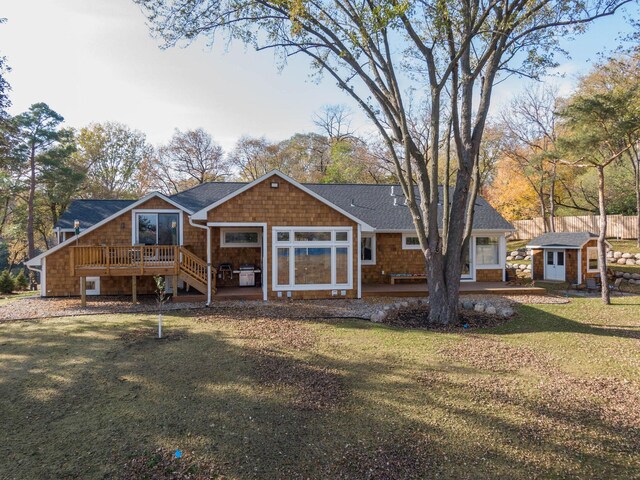 5517 Dickson Rd, Minnetonka, MN 55345 - back of property with a yard and a wooden deck