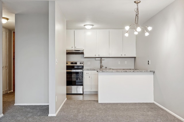 kitchen featuring white cabinetry, stainless steel range, decorative light fixtures, and dark colored carpet