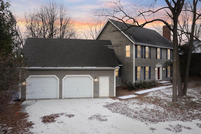 view of front of property featuring a garage