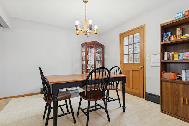 dining room with baseboards, a chandelier, lofted ceiling, light floors, and a baseboard radiator