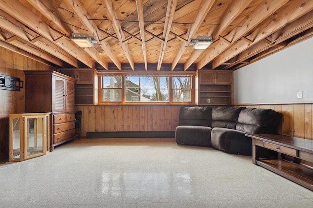 interior space featuring wood walls and wooden ceiling