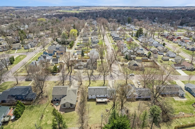 birds eye view of property with a residential view