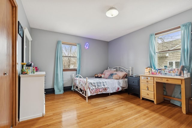 620 8th St SW, Faribault, MN 55021 - bedroom featuring light wood-style floors