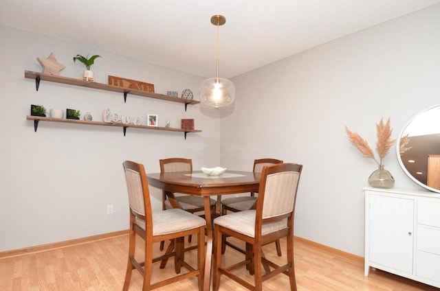 dining room featuring light hardwood / wood-style floors