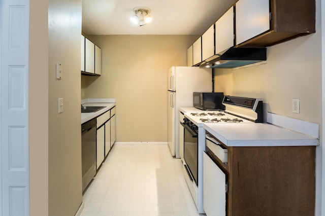 kitchen featuring white cabinets, stainless steel dishwasher, and electric stove