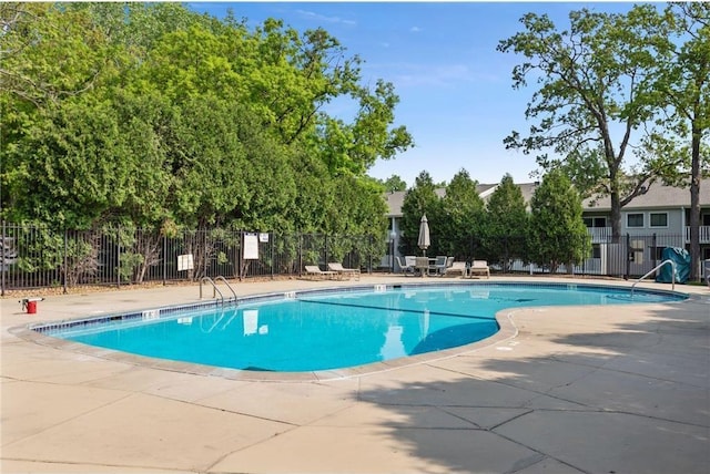 view of pool with a patio area