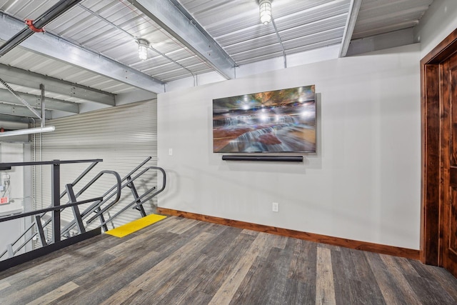9200 Nike Road 31 & 47, Minnetrista, MN 55359 - unfurnished room with baseboards, wood finished floors, and beam ceiling