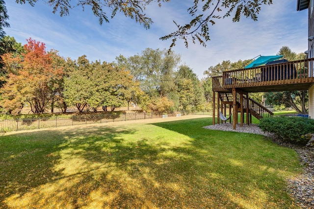 view of yard featuring a wooden deck