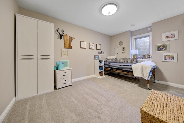 carpeted bedroom with a closet