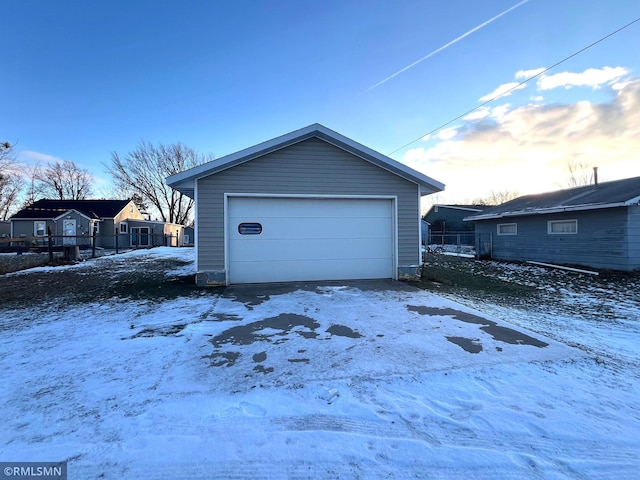 view of snow covered garage