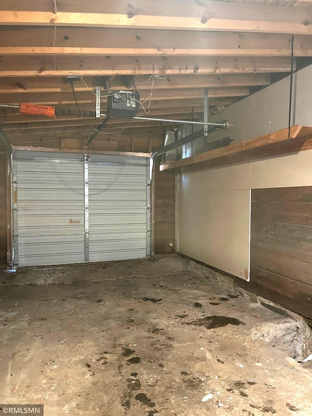 garage featuring a garage door opener