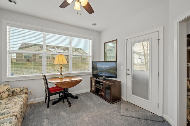 office area with carpet, ceiling fan, and a healthy amount of sunlight