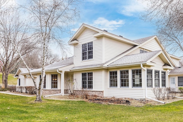 exterior space featuring a front yard