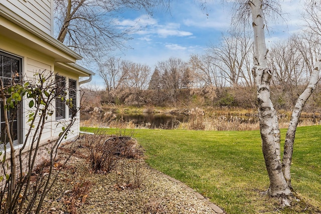 view of yard with a water view