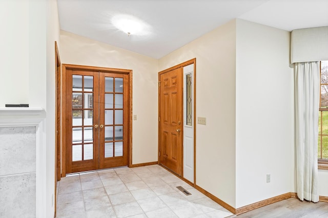 interior space featuring a wealth of natural light and french doors