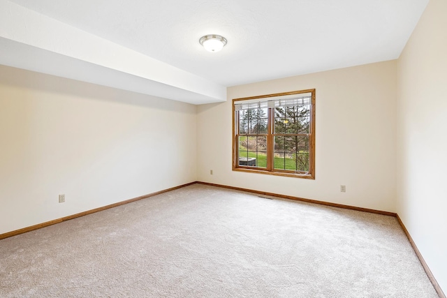 spare room with carpet flooring