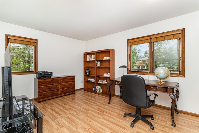 3507 Maplewood Dr, Saint Anthony, MN 55418 - office space with wood finished floors, plenty of natural light, and baseboards