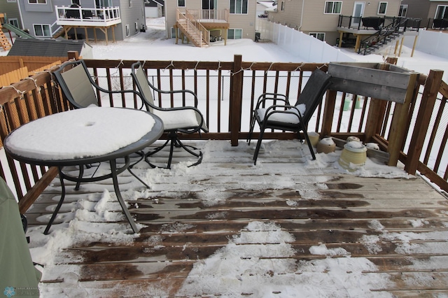 view of snow covered deck