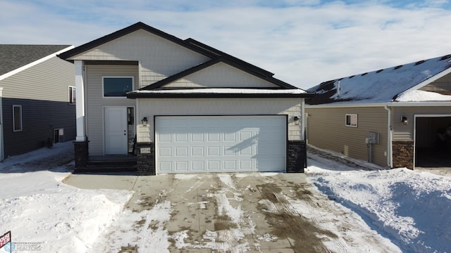 view of front of property with a garage