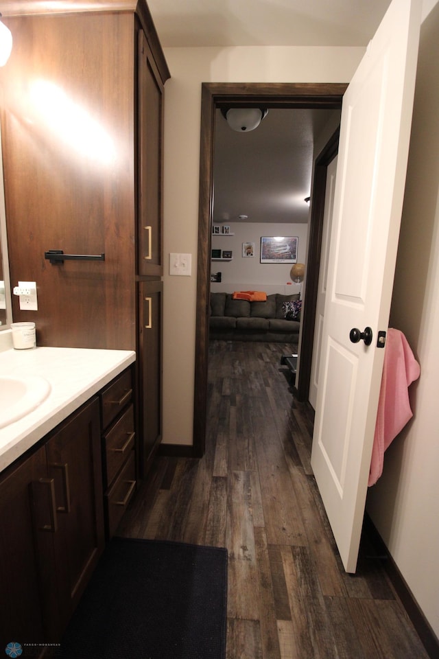 bathroom with vanity and hardwood / wood-style floors