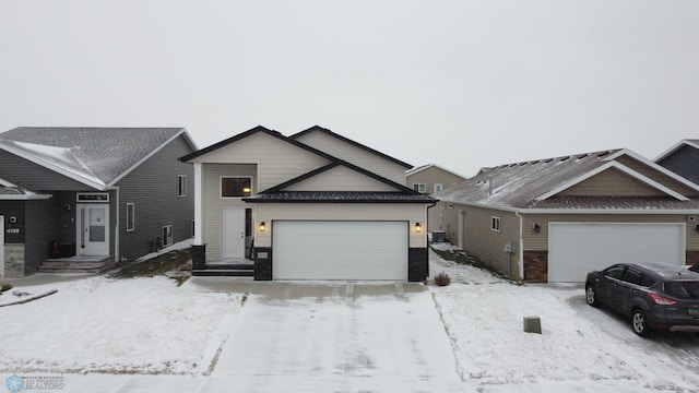 view of front of home with a garage