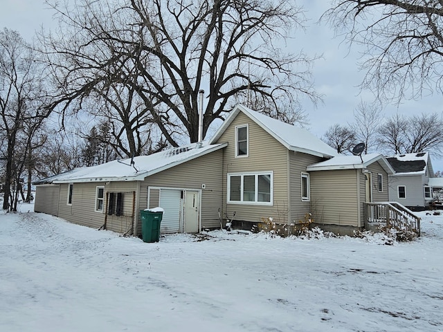 view of snow covered property