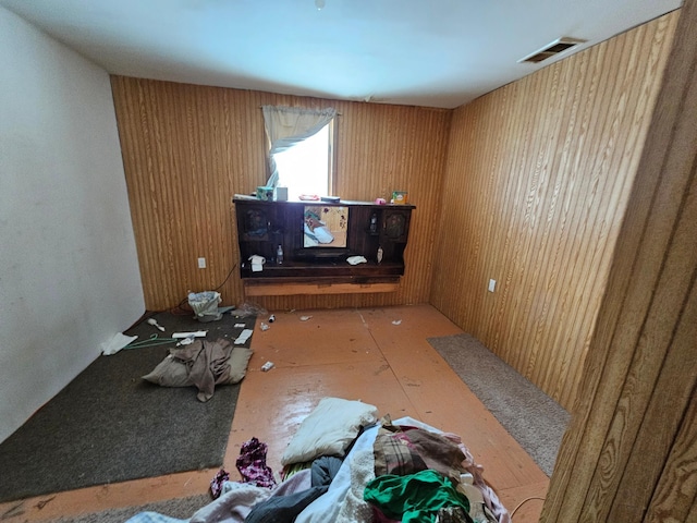 interior space featuring wood walls