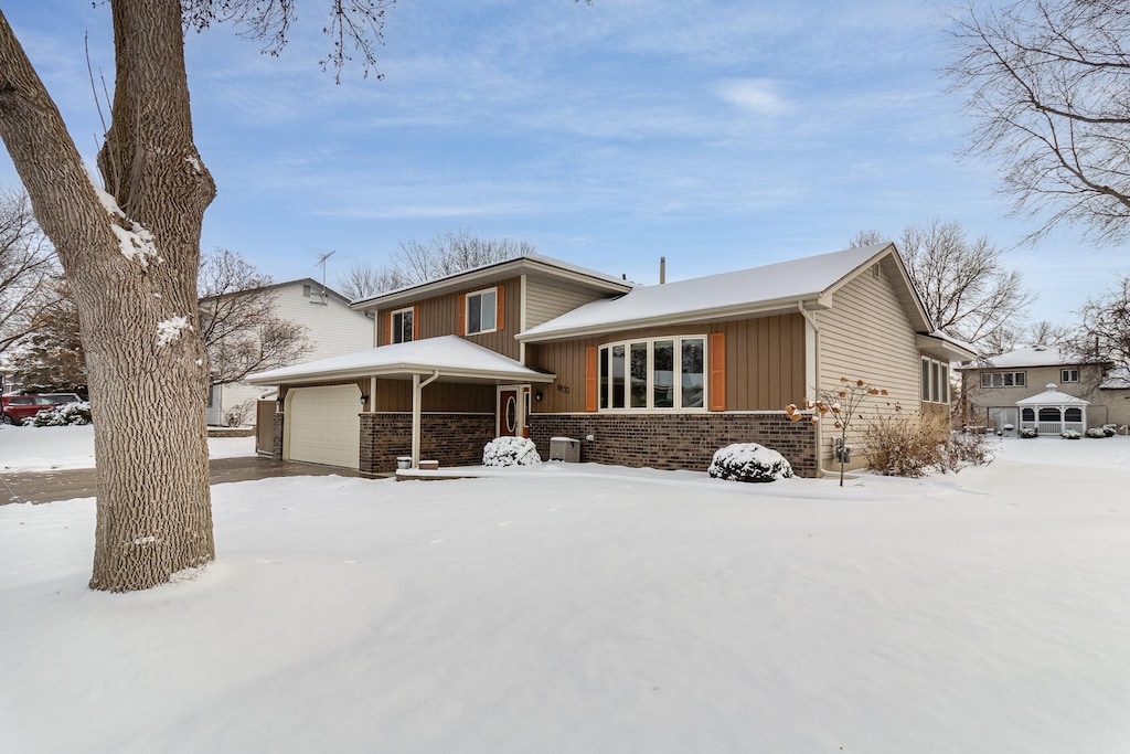 split level home featuring a garage