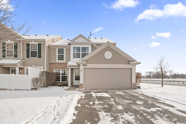 view of front of property with a garage