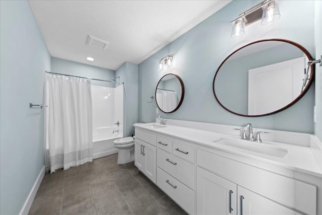 full bathroom featuring shower / tub combo, vanity, a textured ceiling, and toilet