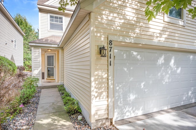 entrance to property with a garage