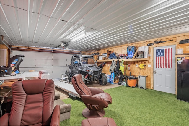 garage featuring a yard