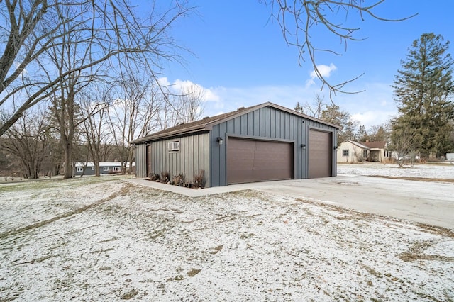 view of snow covered garage